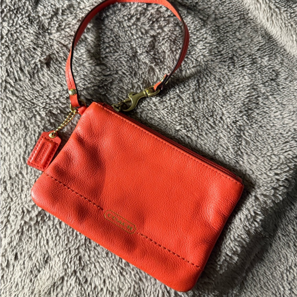 Orange Leather Coach Wristlet